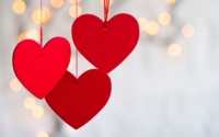 three-hanging-red-hearts-on-defocused-light-background–155153445-5a32b51113f1290037a41461